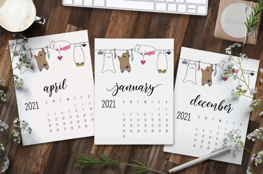 Set of three 2021 calendars with cute animals on washing line with text overlay