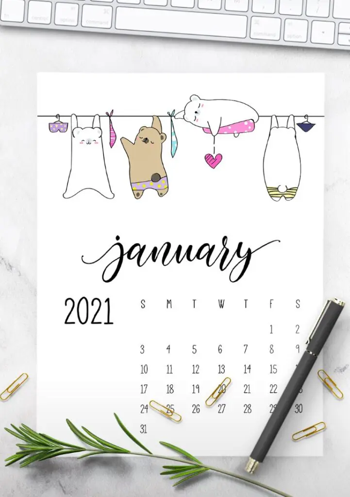 2021 calendar with cute animals hanging on washing line and text overlay - Free Printable Calendar 2021 pages from January to December 