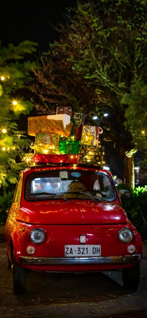Christmas iPhone Aesthetic Wallpaper Red Car With Gifts