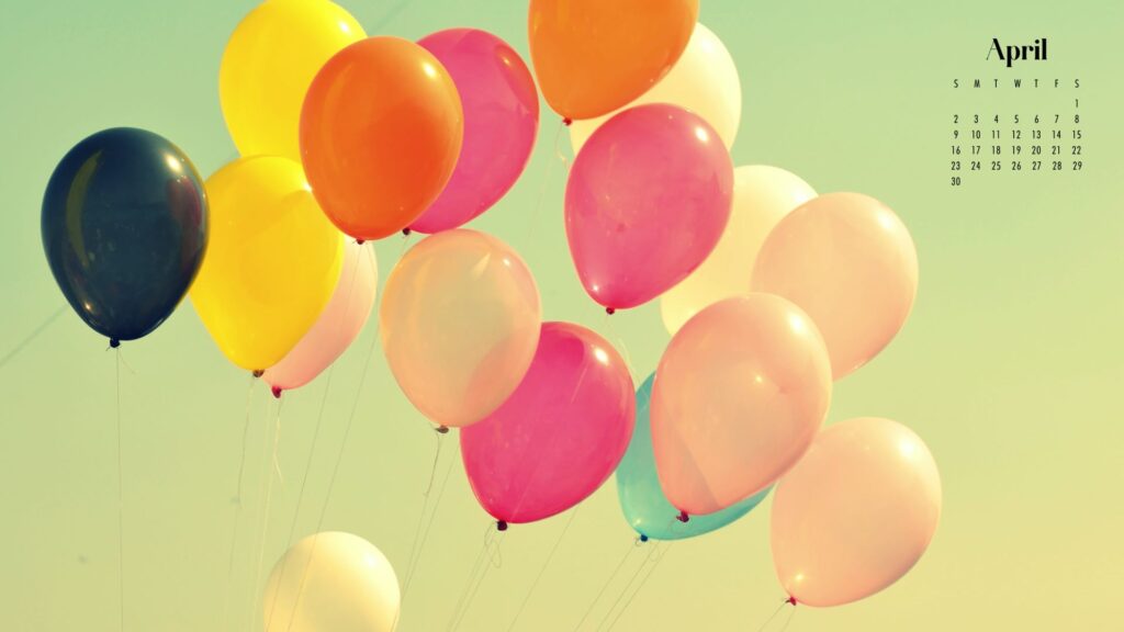 a desktop wallpaper of pastel balloons floating