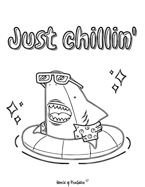 a shark on a floatie with the words 'just chillin'