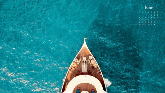 Aesthetic June 2023 Calendar Wallpaper - a boat in the sea