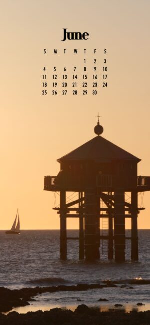 a beach tower and boat