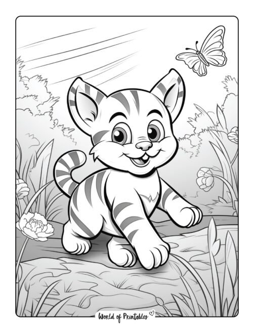 Kitten Playing on the Grass Coloring Page